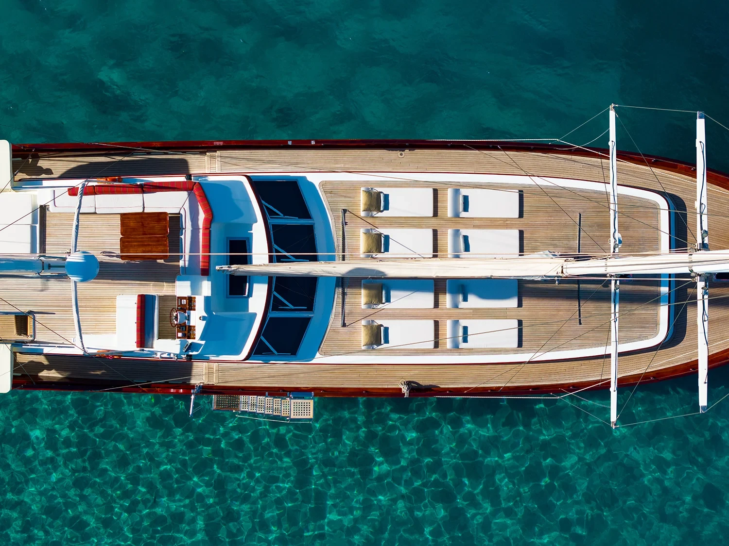 Deluxe motor sailer charter Gocek aerial overhead view of the sun deck and flybridge