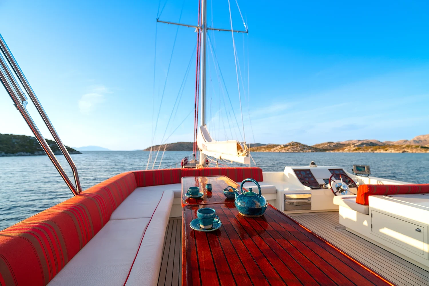 Deluxe motor sailer charter Gocek flybridge alfresco dining table under the sun awning