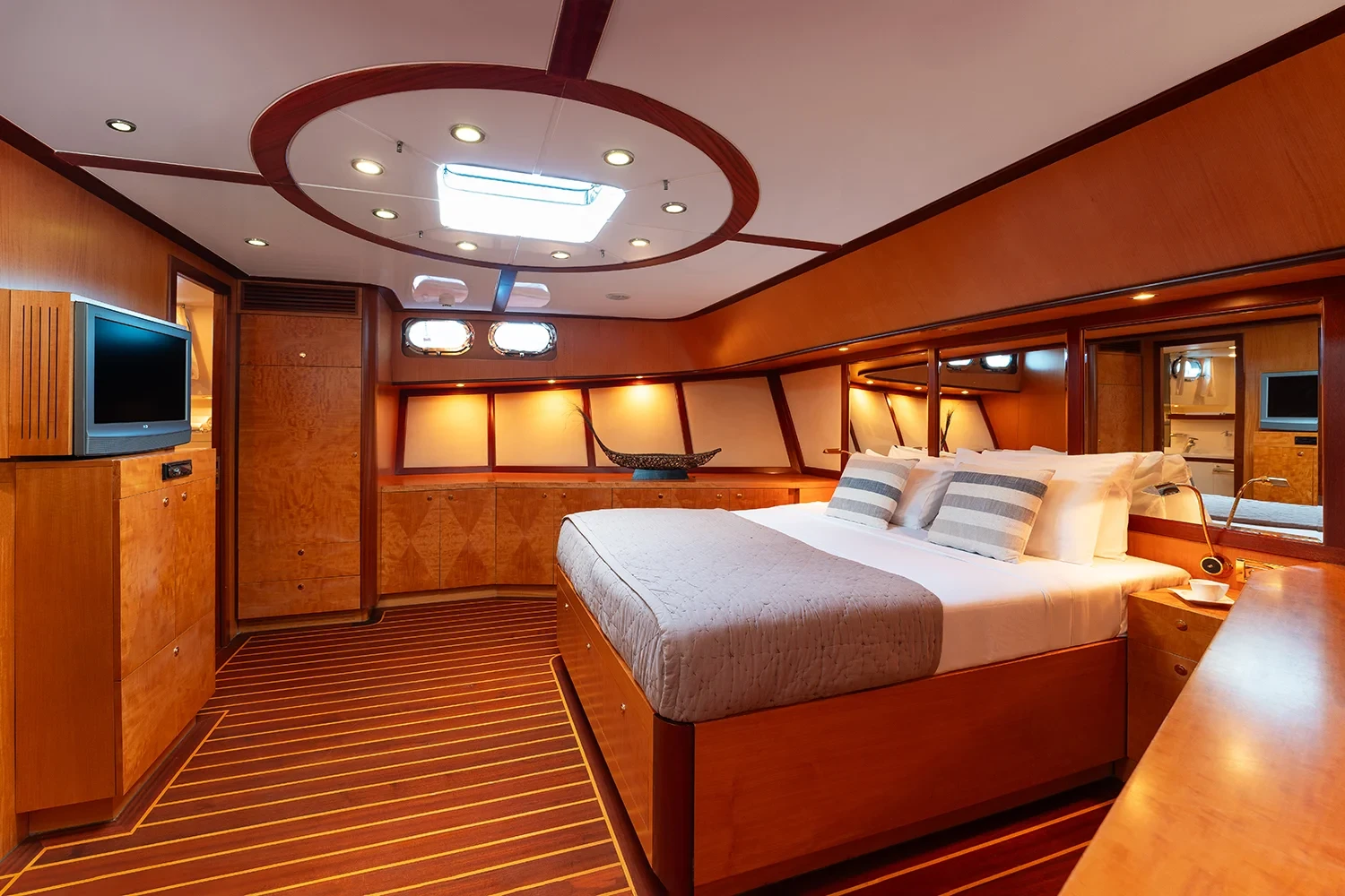 Deluxe motor sailer charter Gocek master cabin second view with round skylight