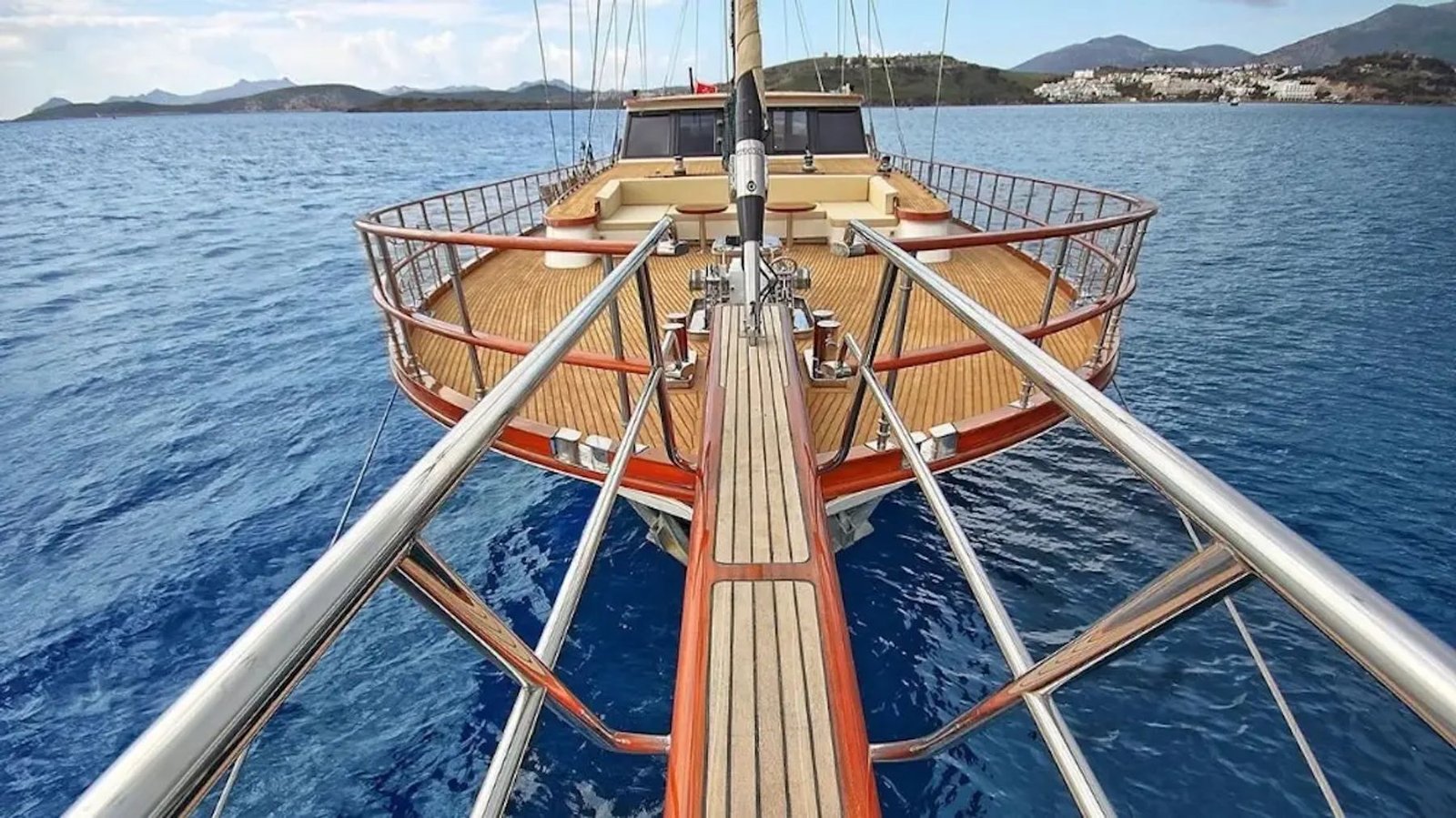 Bowsprit view along the foredeck of the motor sailer charter yacht