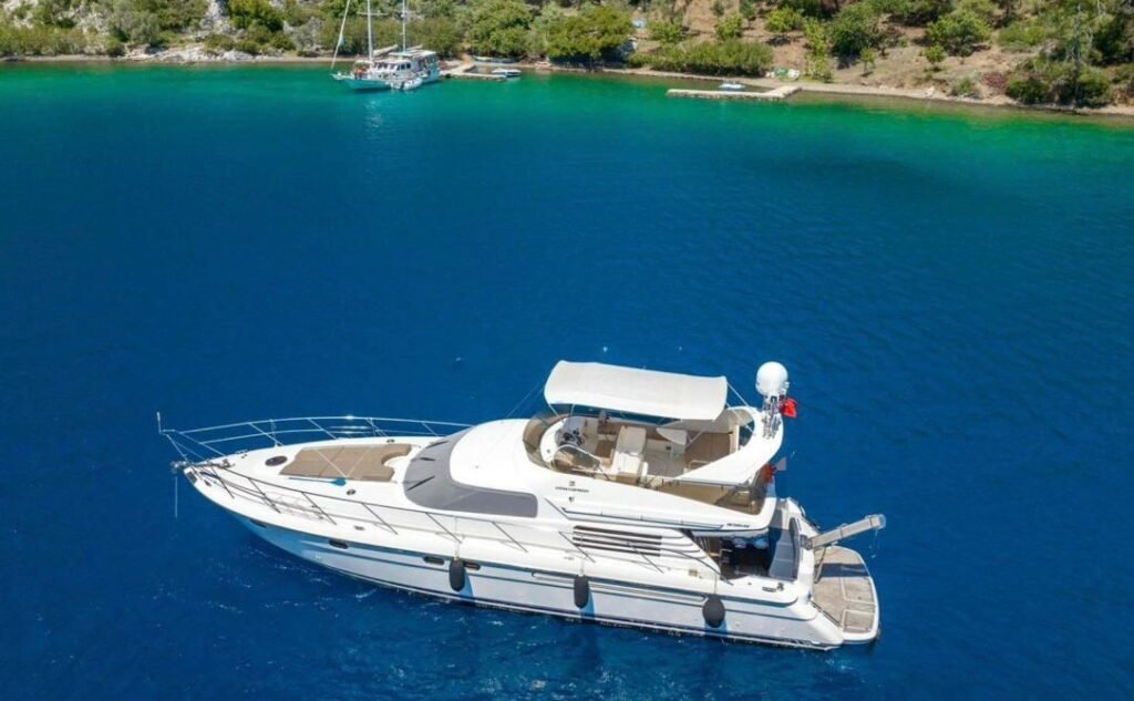 Fairline 59 charter Göcek — aerial view of the yacht at anchor
