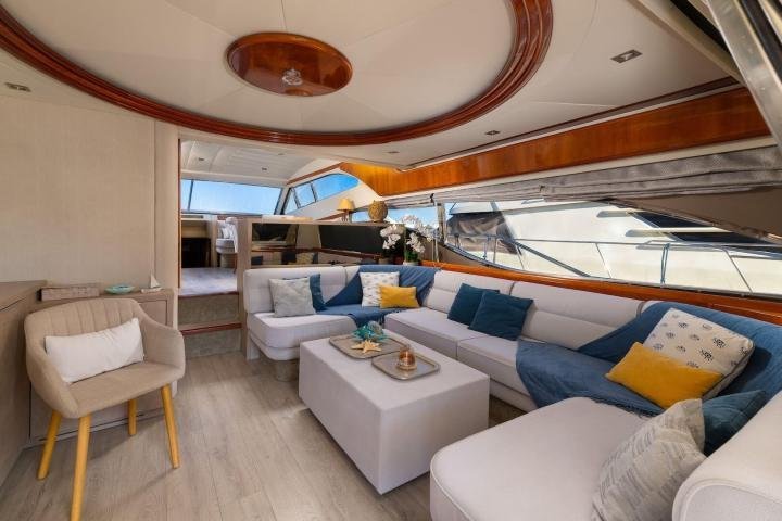 Ferretti 68 charter Rhodes MA2004 main salon with cream leather seating