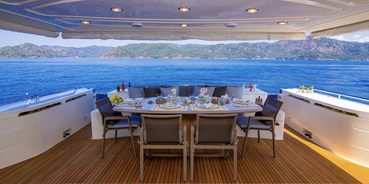 Ferretti 780 charter Göcek aft deck alfresco dining