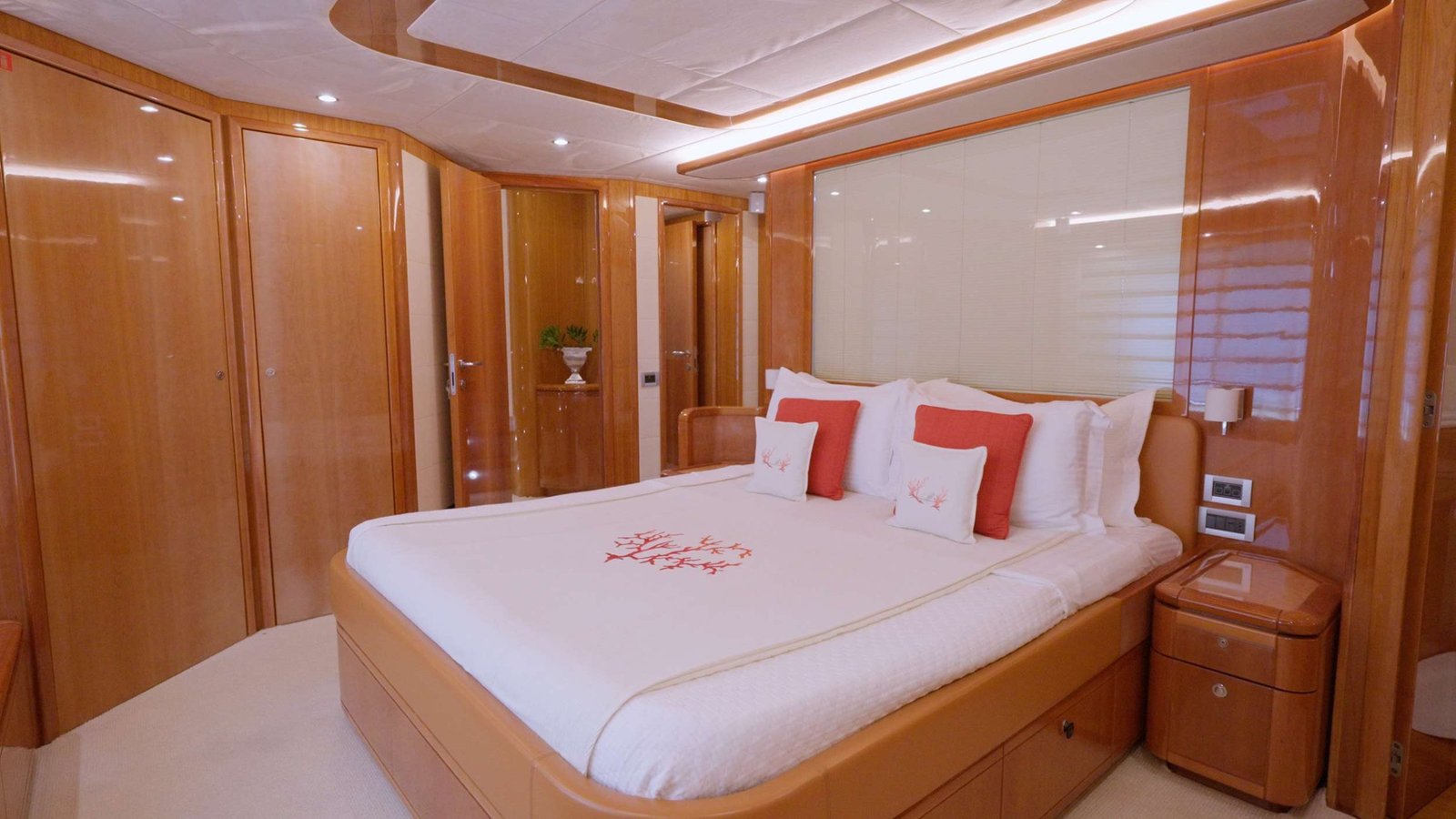 VIP stateroom with king bed and en-suite bathroom aboard a Ferretti 830 Fly charter Rhodes