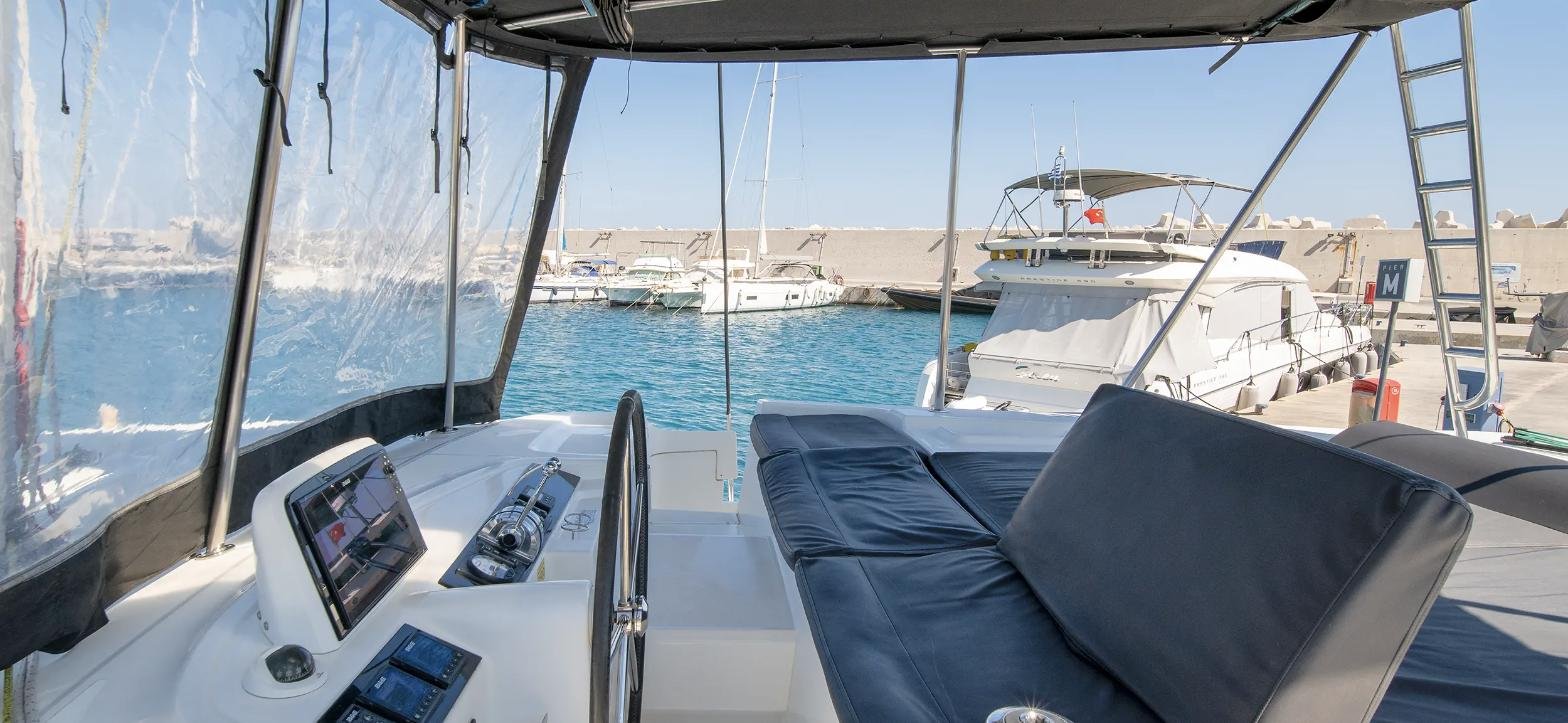 Lagoon 46 catamaran charter Rhodes – aft cockpit seating overlooking the marina