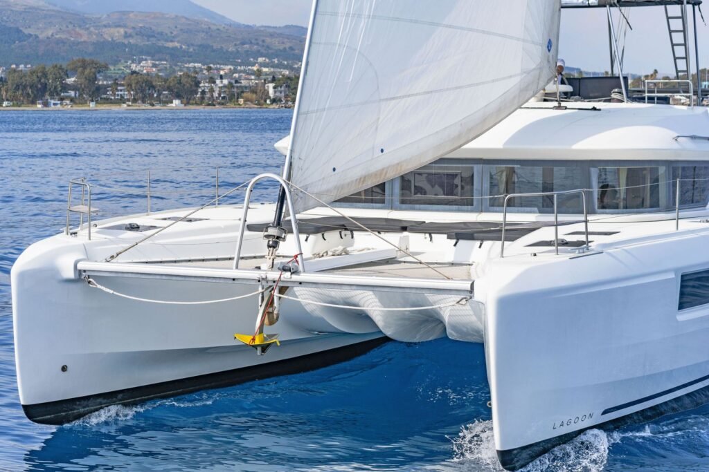 Lagoon 50 catamaran charter KO1508 sailing bow-on with mainsail and genoa set