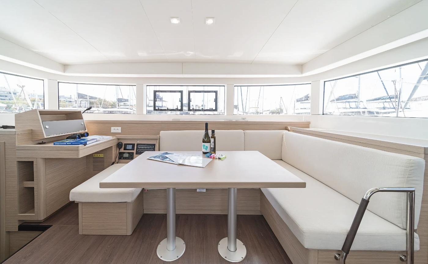 Saloon dining settee and chart table on a Lagoon 40 charter Rhodes catamaran