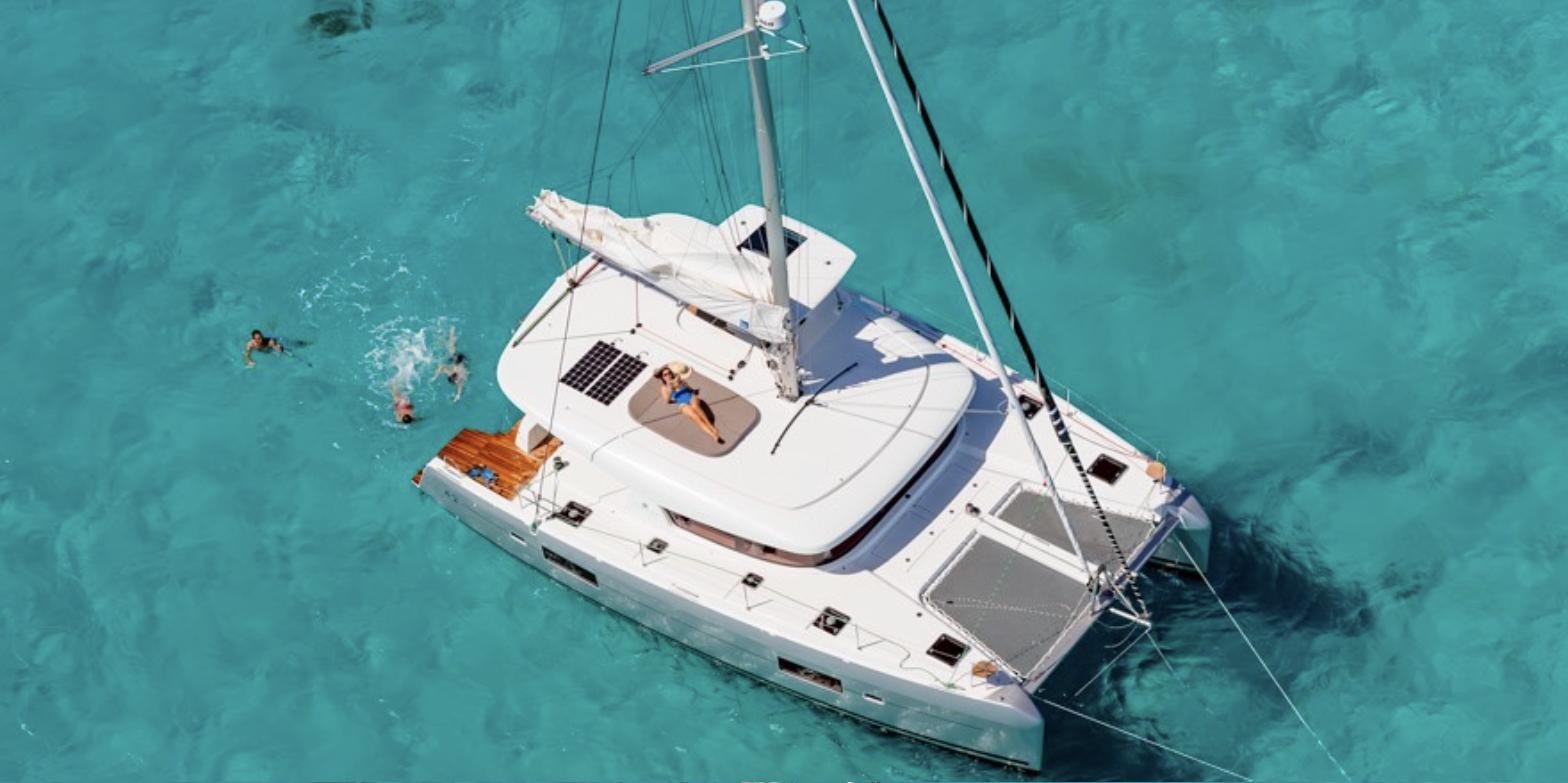 Starboard profile of the 2024 Lagoon 42 sailing catamaran available for charter in Marmaris