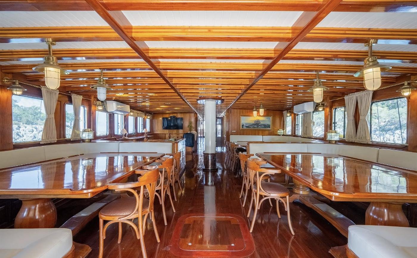 Main dining saloon seating 36 guests aboard a 47m gulet in Bodrum
