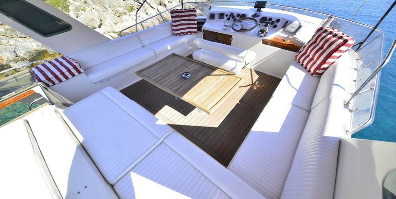 Flybridge helm and seating on a luxury yacht charter in Fethiye