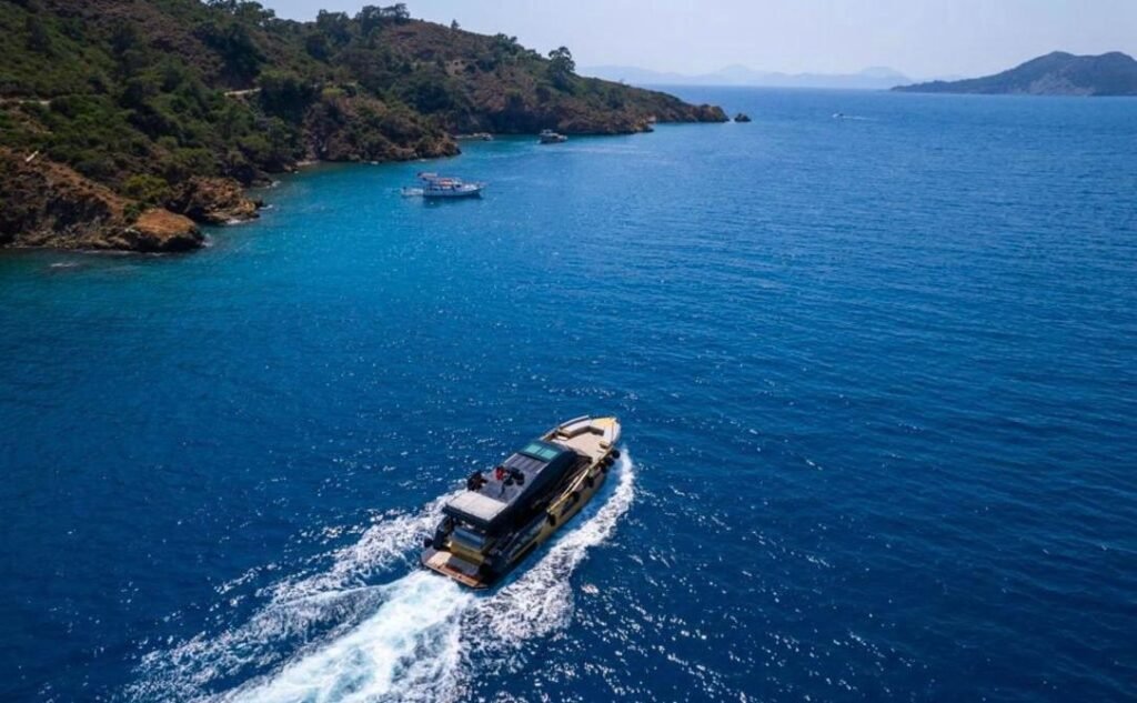 Mazu 58 charter Göcek — aerial view of the yacht cruising the Turquoise Coast