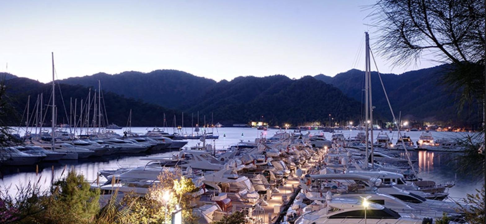 Mengi Yay 110 charter Göcek — D-Marin Göcek marina at dusk