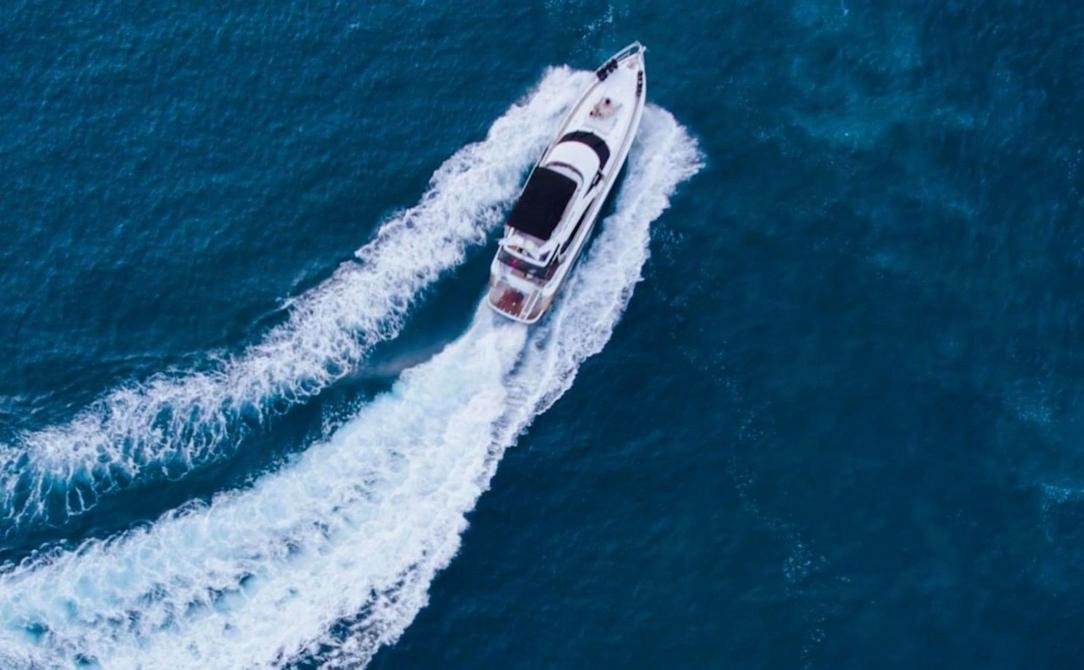 Overhead drone shot of the motor yacht charter Antalya and her wake