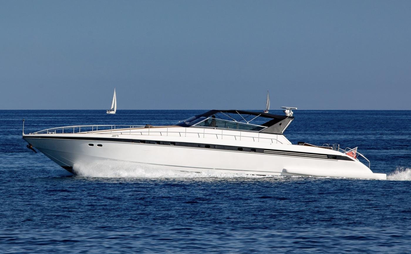 23m Italian motor yacht under way off Sicily on a motor yacht charter Sicily