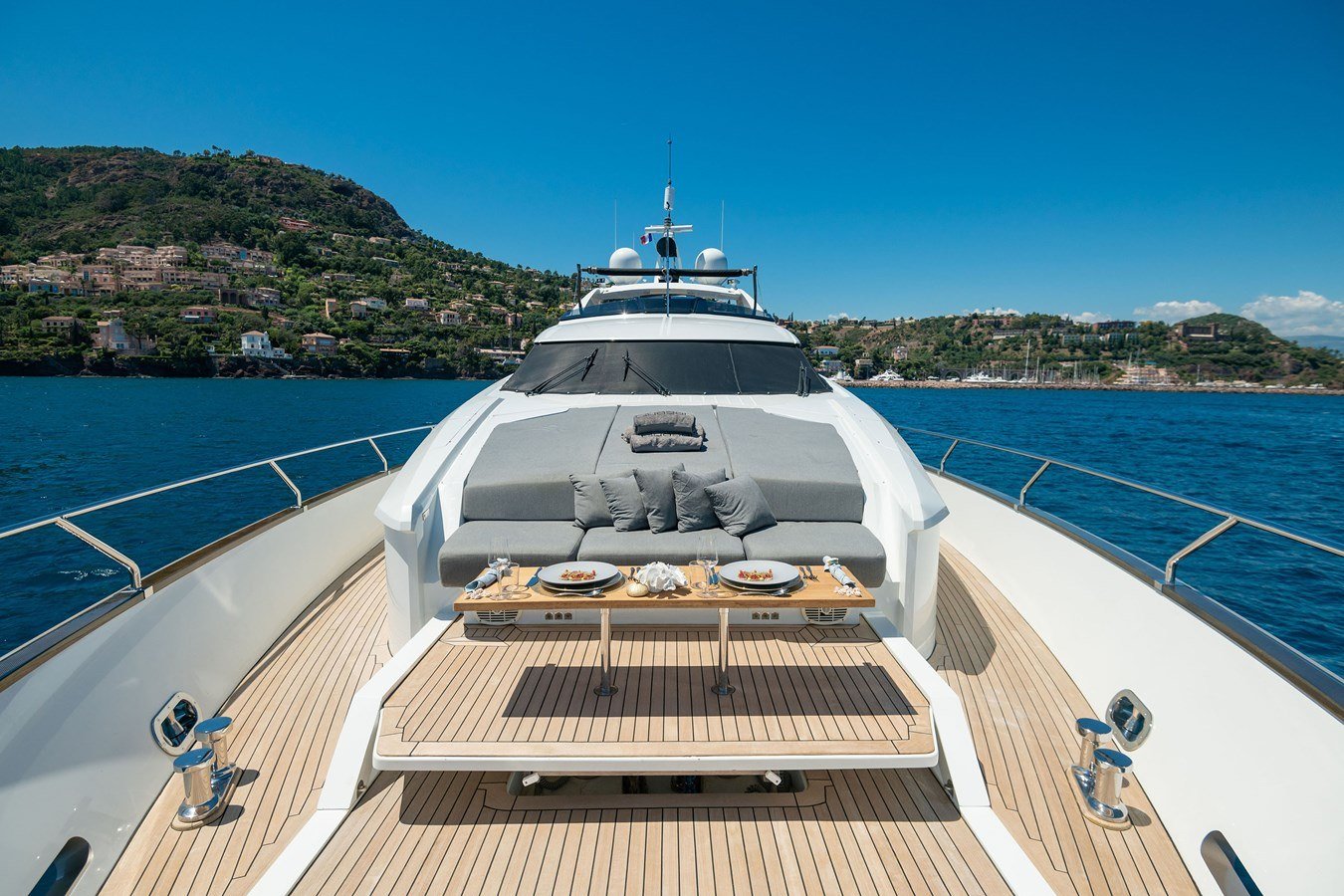 Foredeck sun pad and low table on the bow of a Peri 37 charter Göcek