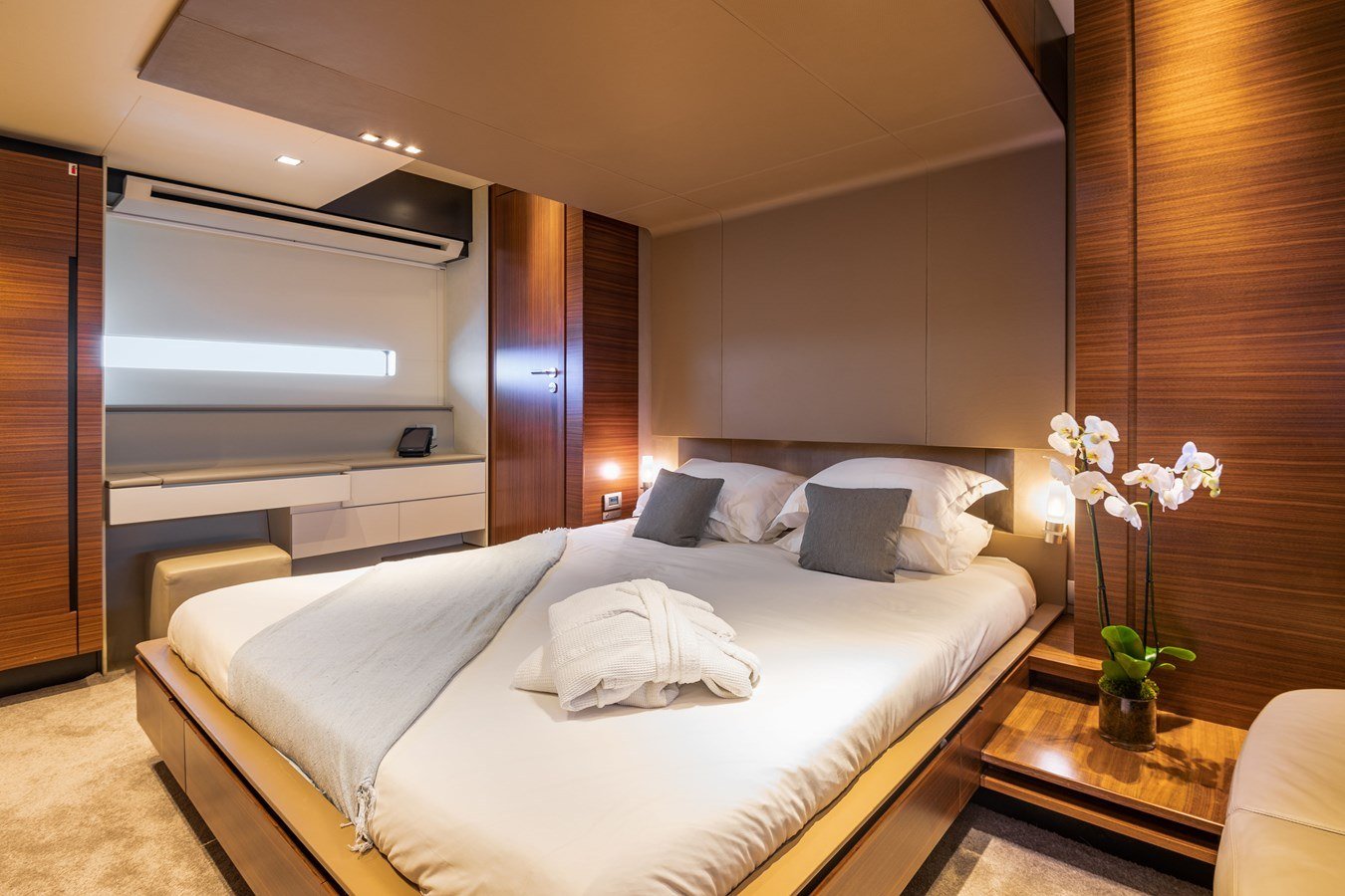 Master stateroom with king bed and walnut joinery aboard a Peri 37 charter Göcek