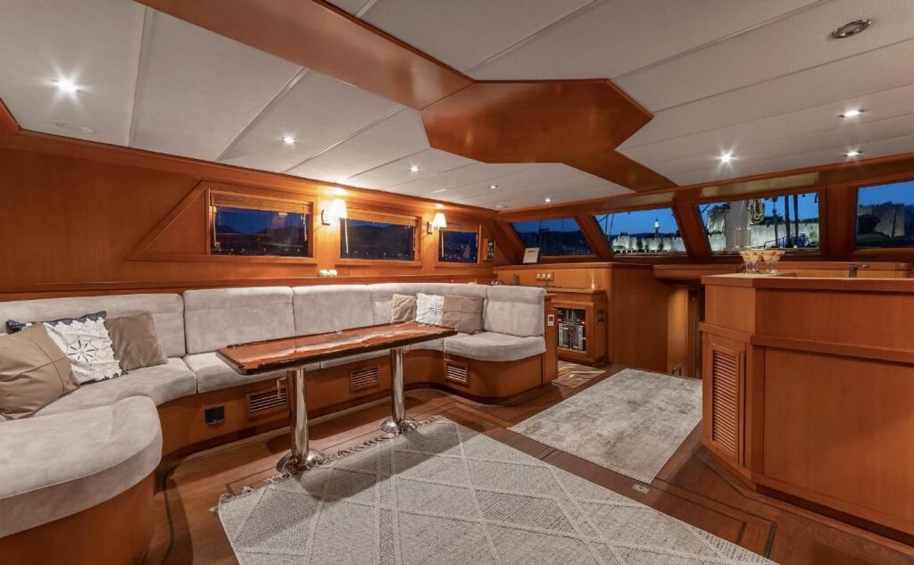 Main saloon with corner banquette and bar aboard a premium gulet charter Bodrum yacht