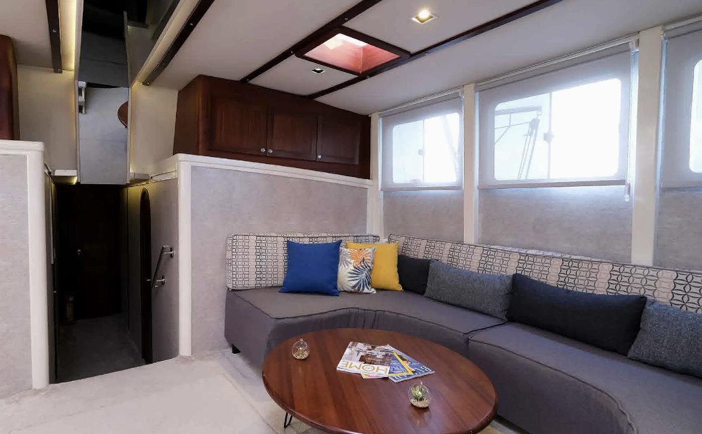 Air-conditioned saloon with corner seating on a premium gulet charter Fethiye