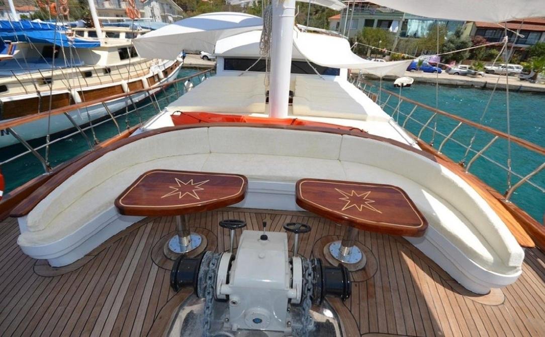 Premium gulet charter Marmaris - foredeck seating with inlaid star tables