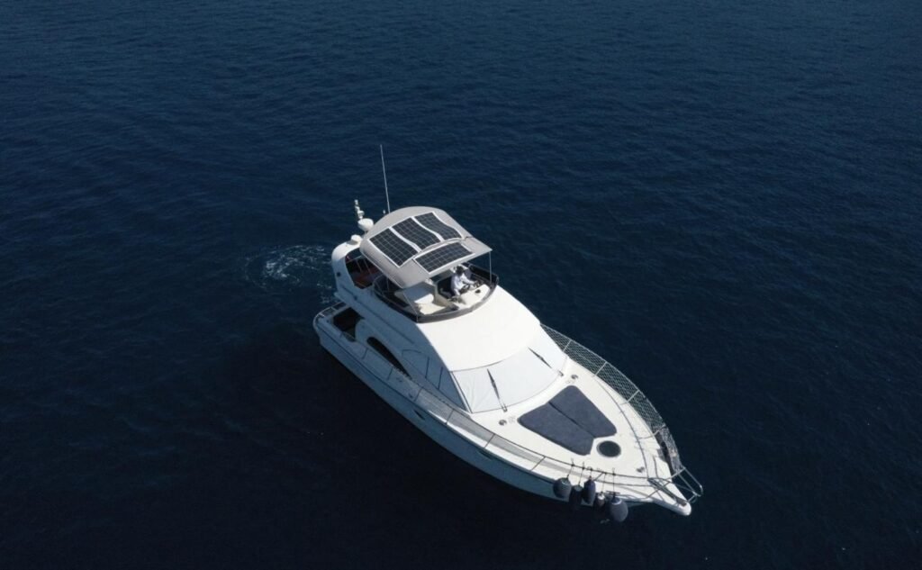 Rodman 41 charter Gocek — flybridge motor yacht cruising off Gocek