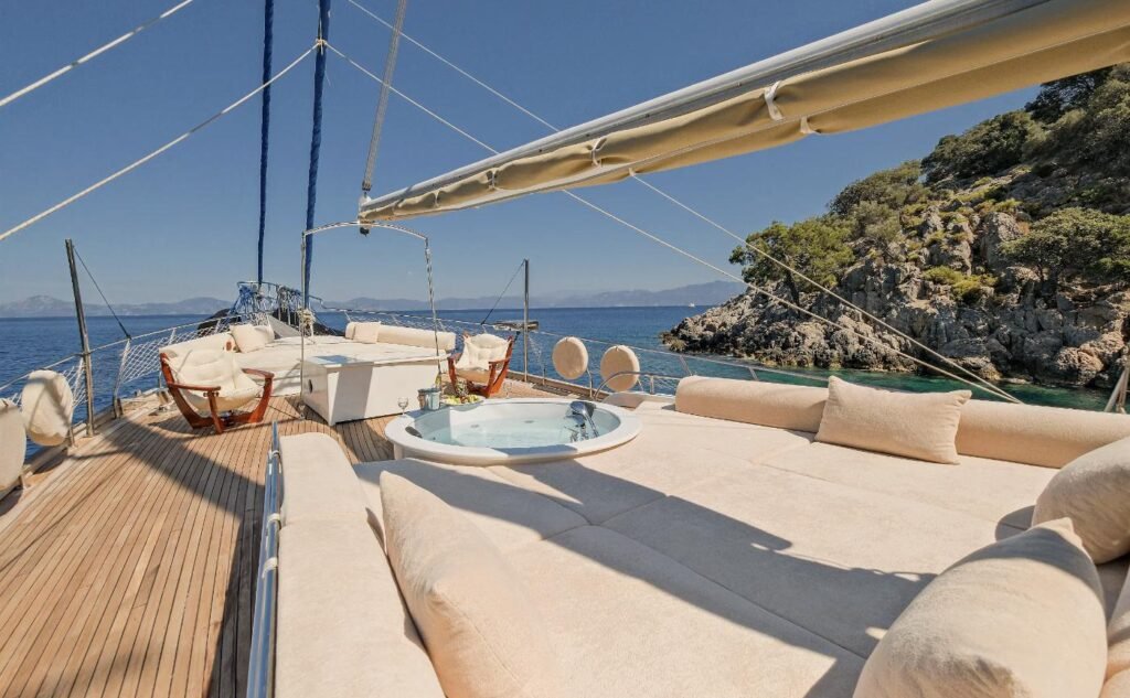Foredeck lounge, sunpads and jacuzzi on a 36m gulet in a Fethiye cove