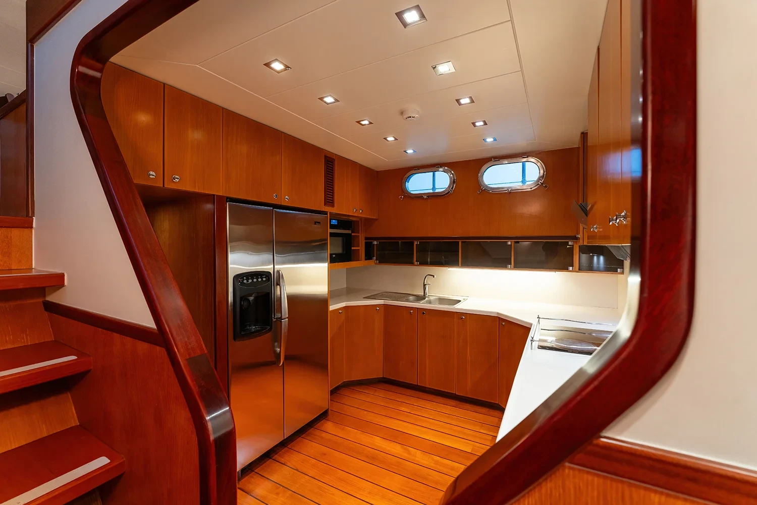 Galley aboard a sailing yacht charter in Bodrum with full-size fridge freezer and stainless steel counters