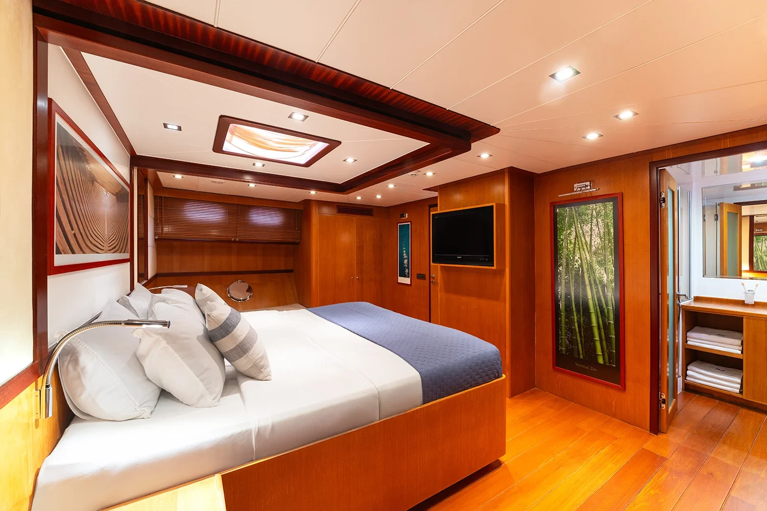 Master cabin aboard a sailing yacht charter in Bodrum with a double berth and mounted television