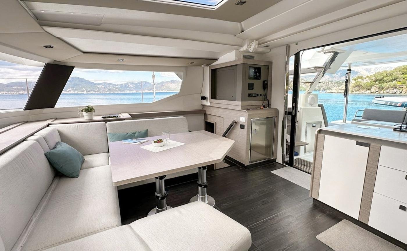 Tanna 47 charter Marmaris - open-plan saloon flush with the cockpit through a full-width door