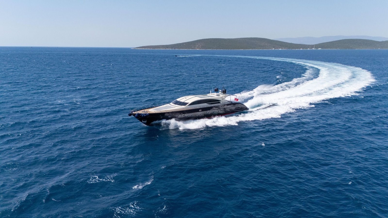 Tecnomar 116 charter Bodrum underway off the Bodrum peninsula, seen from the air