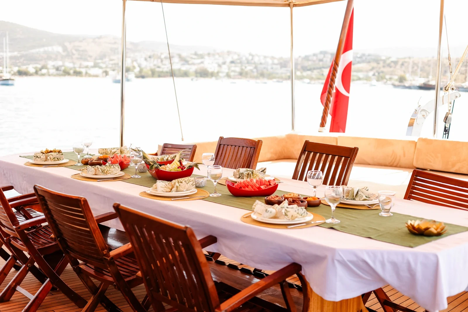 SW3001 30m traditional gulet charter Turkey aft deck dining table spread with Turkish mezze