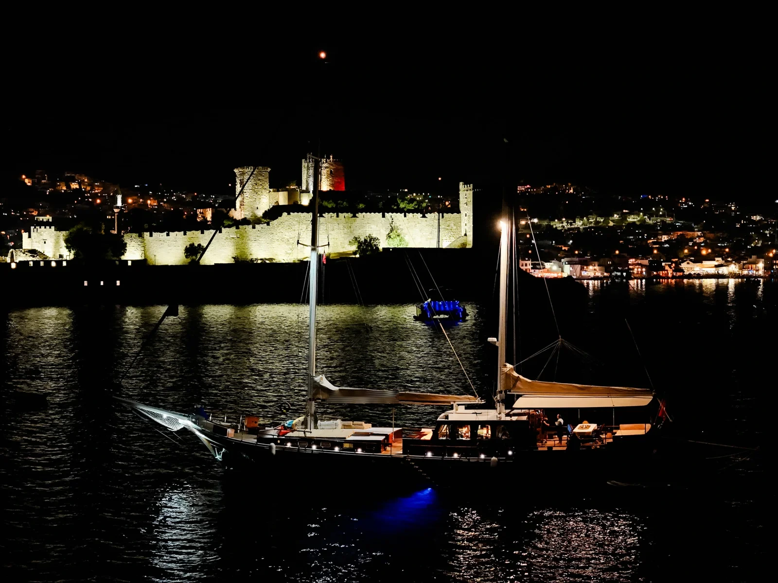 SW3001 30m traditional gulet charter Turkey sailing past Bodrum Castle at night