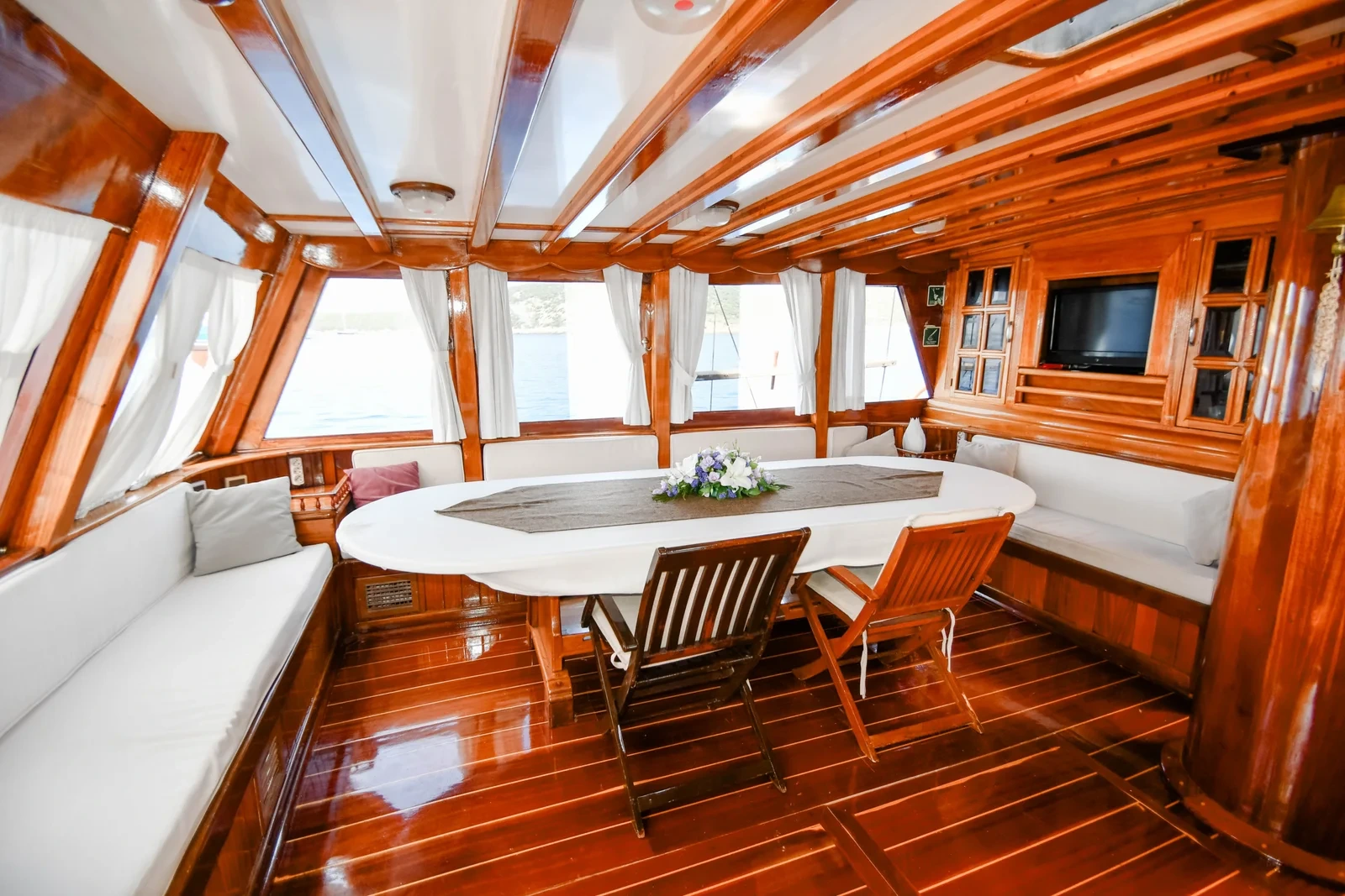SW3001 30m traditional gulet charter Turkey interior saloon dining area with panoramic windows