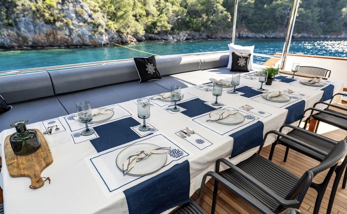 Shaded aft-deck dining area on a trawler charter Fethiye, Turkey