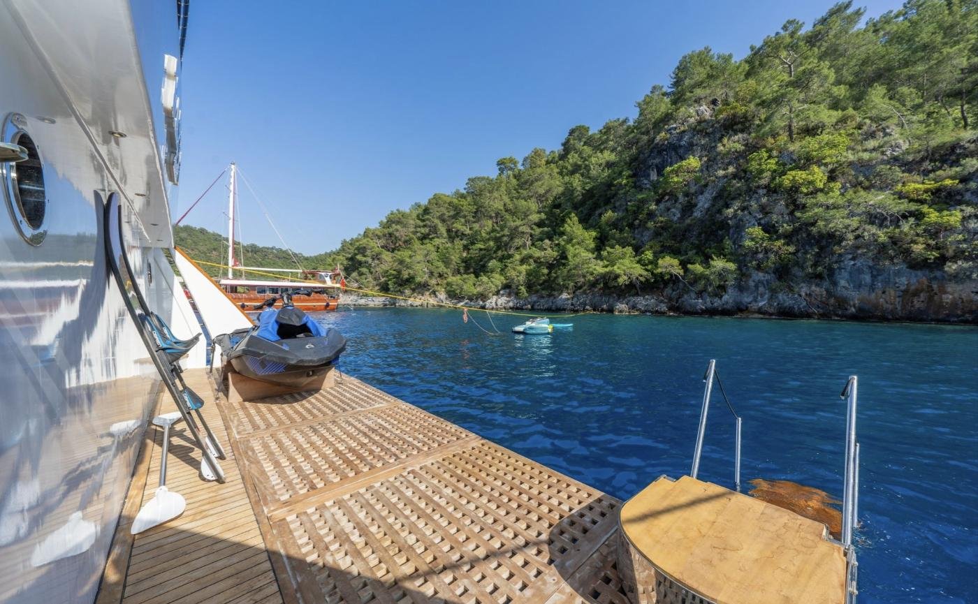 Swim platform with jet ski and boarding ladder on a trawler yacht charter in Fethiye