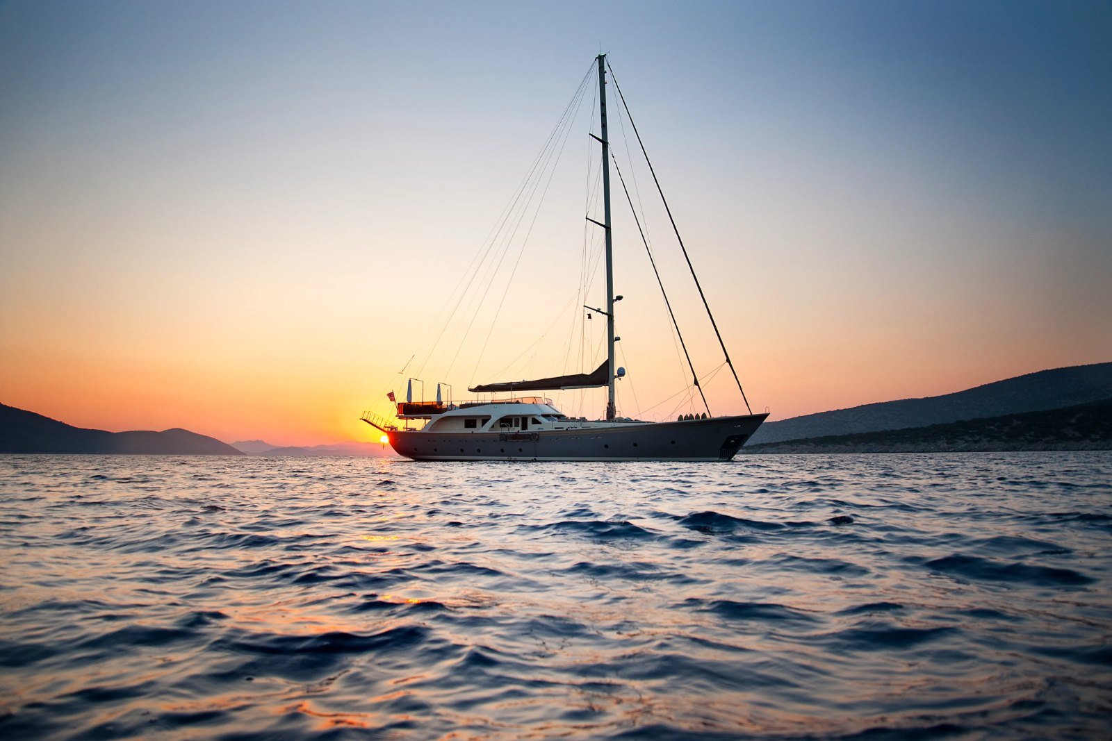 34m luxury gulet charter Bodrum at anchor at sunset