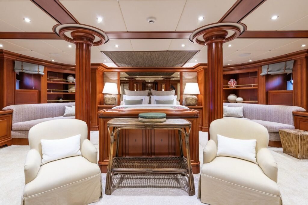 Master cabin with panelled timber and en-suite aboard the 56m sailing yacht