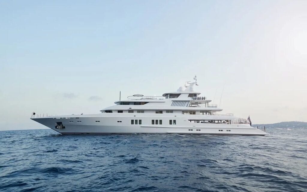 73m superyacht charter Greece - full profile of the Lürssen at sea, four decks above the waterline