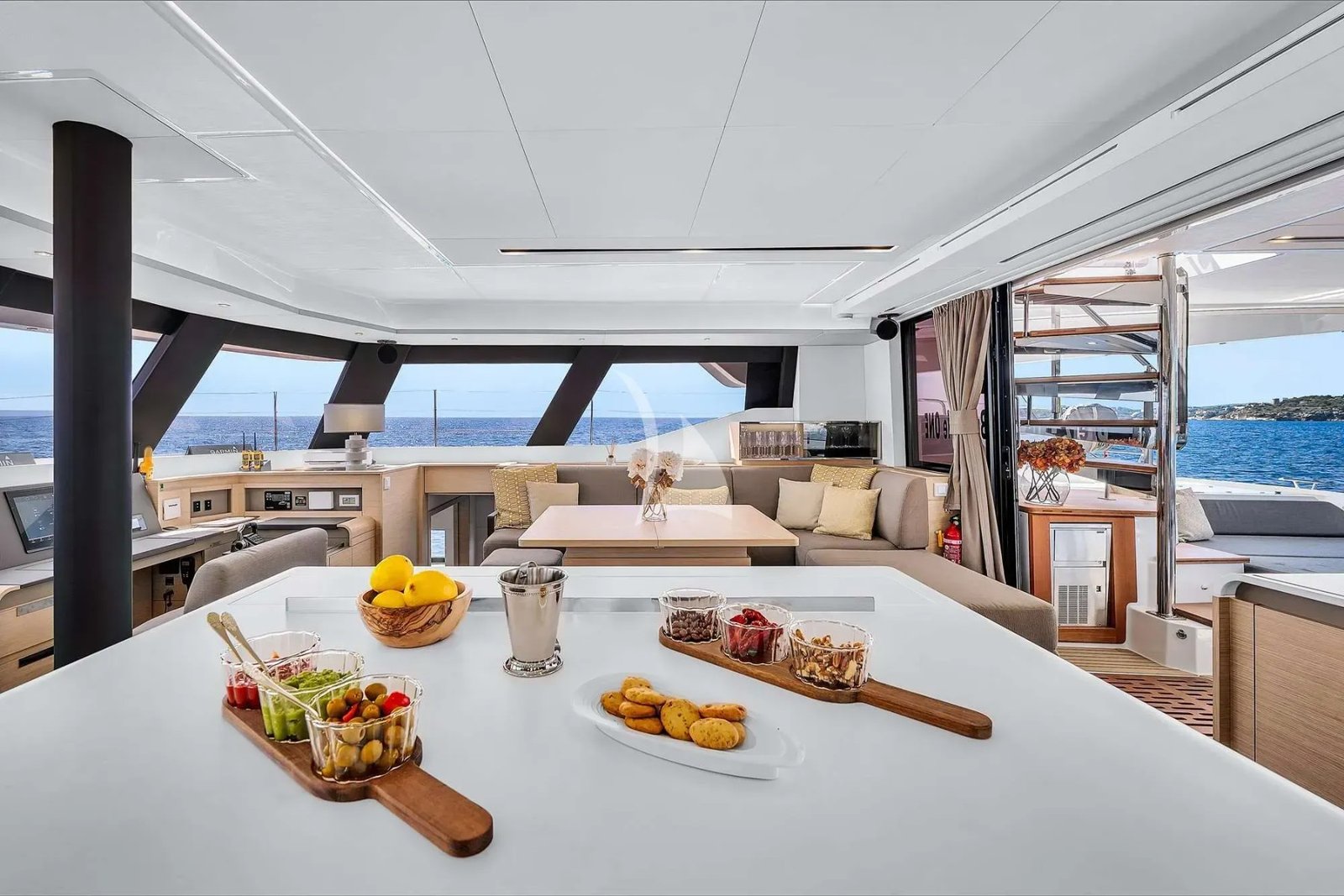 Alegria 67 charter Ibiza catamaran cockpit dining table