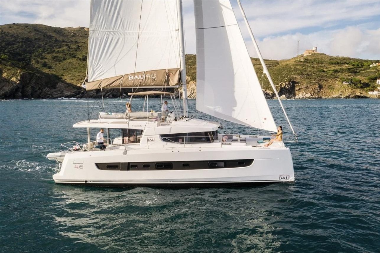 Catamaran charter Fethiye - starboard profile of the Bali 4.6 under sail with guests on deck