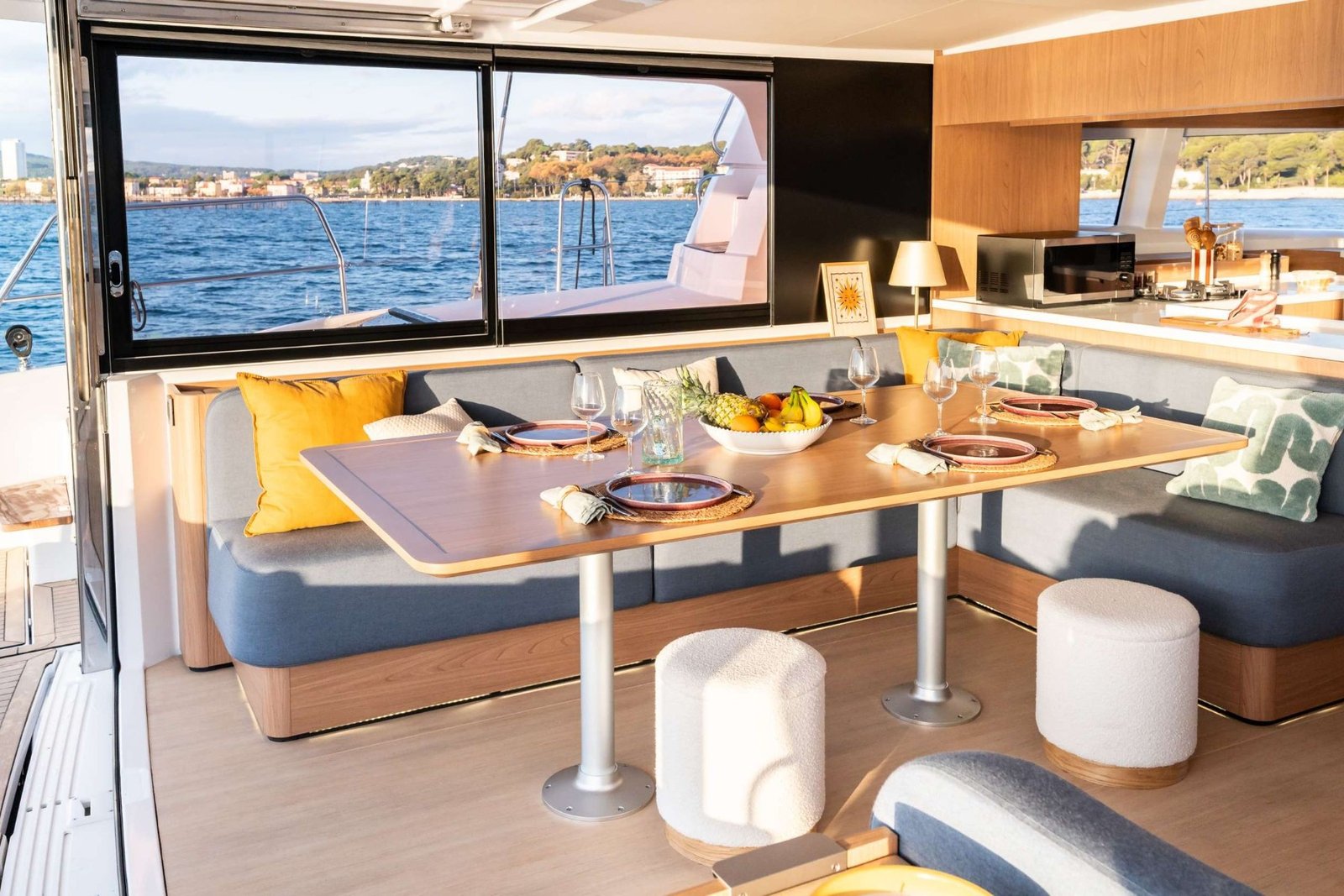 Bali 5.2 charter Ibiza catamaran main salon with the bulkhead open