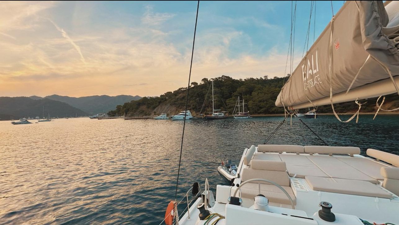 Cockpit and helm at sunset, catamaran charter Gocek