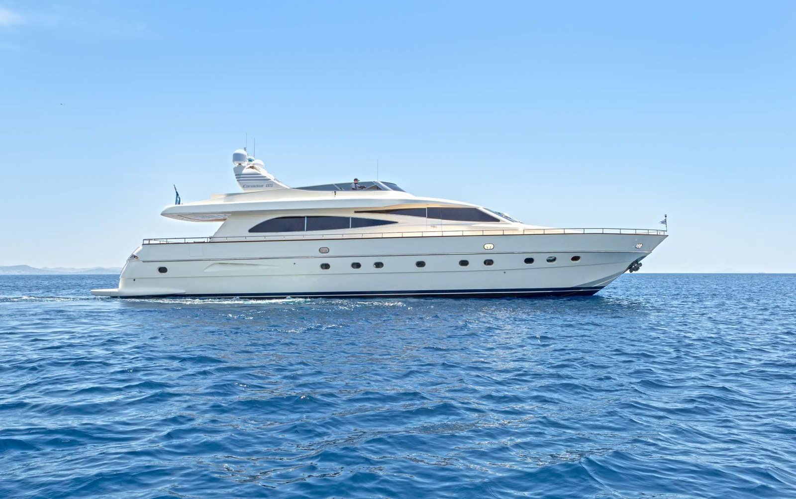Canados motor yacht charter Greece under way off the Athens coast