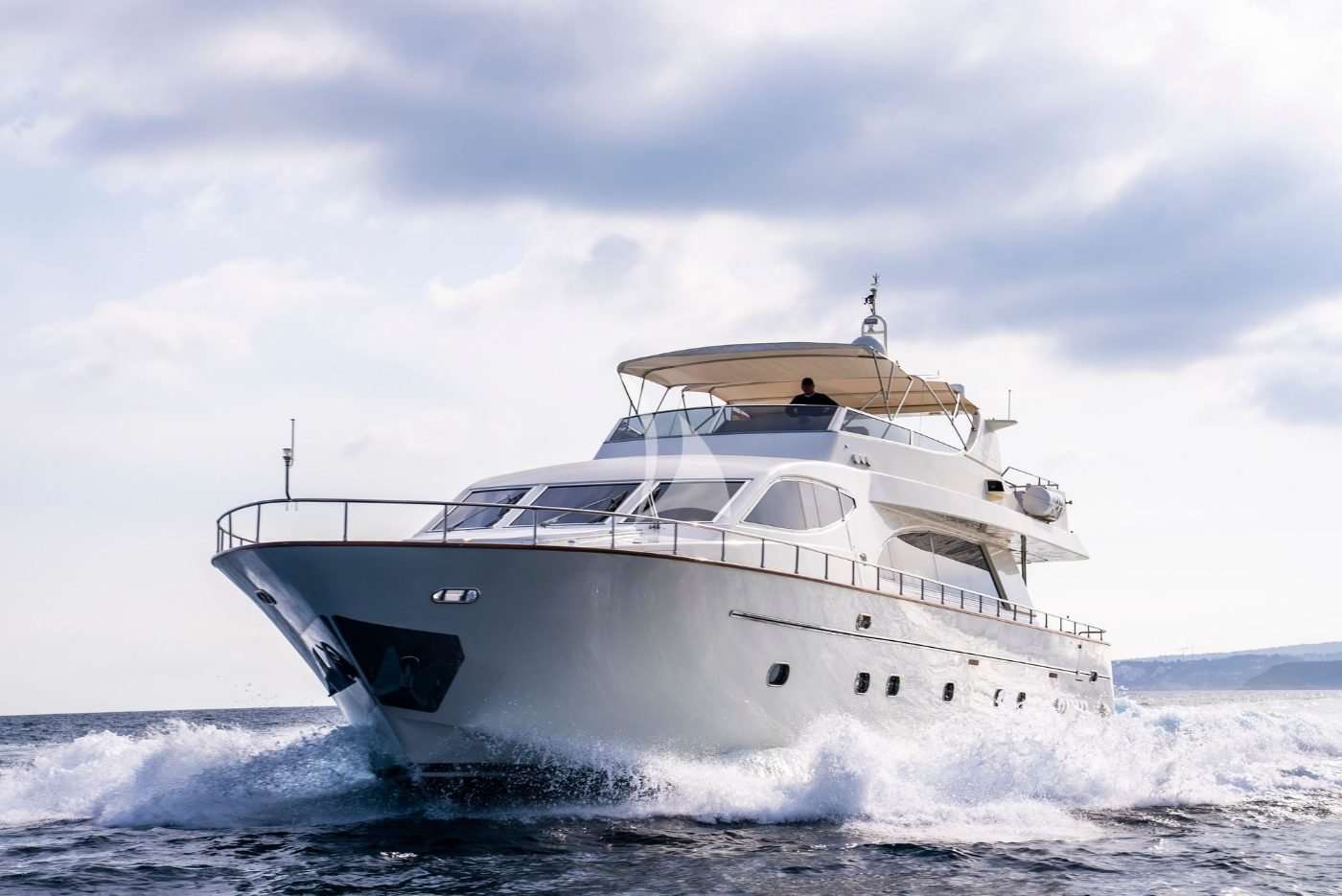 Bow view of the Falcon 86 charter Ibiza motor yacht under way