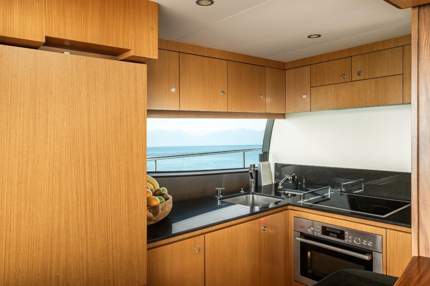 Galley with oven and full inventory on a Ferretti 630 motor yacht charter Mykonos