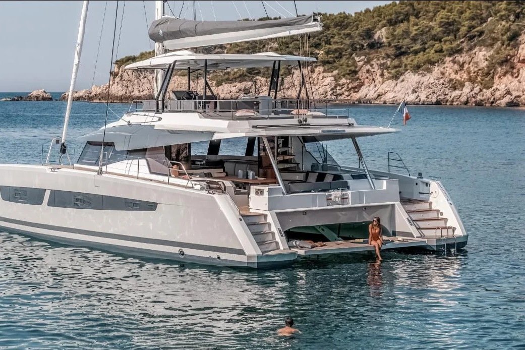 Fountaine Pajot Samana 59 for sale, three quarter profile at anchor