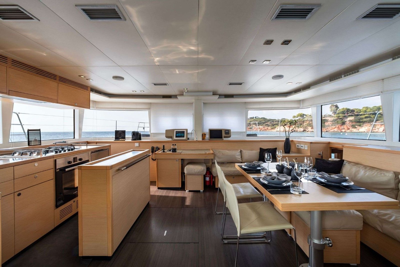 Lagoon 560 charter Athens catamaran main salon and galley