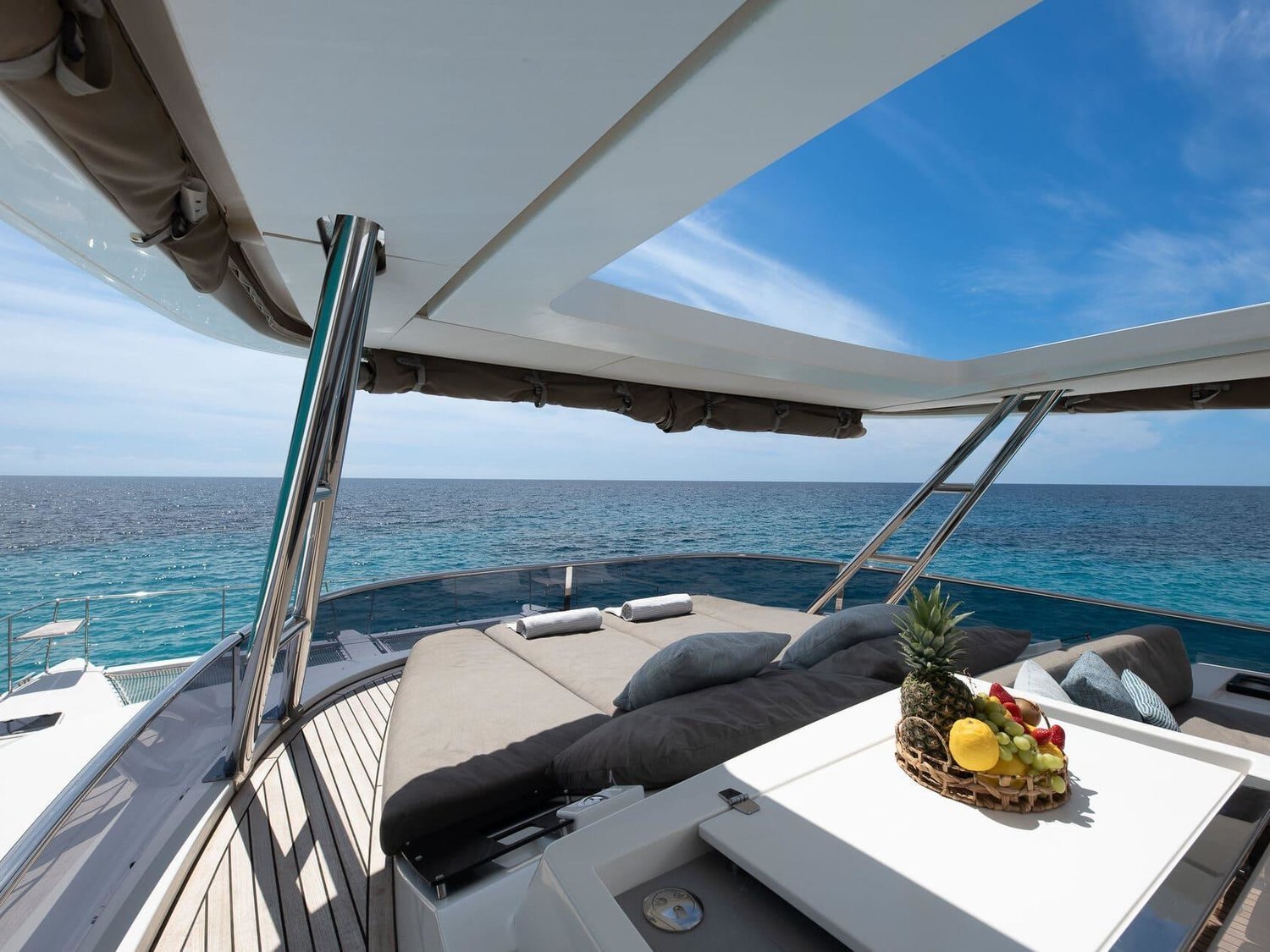 Flybridge and hardtop of the Lagoon 630 charter Ibiza crewed power catamaran