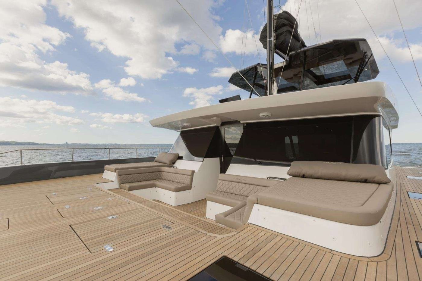 Foredeck sunpads and flybridge of the Moon Yacht 60 charter Athens sailing catamaran