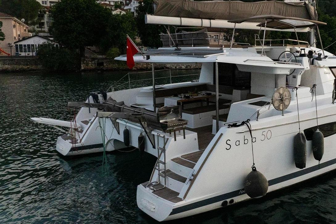 Stern and bathing platform of a Saba 50 charter catamaran in Turkey