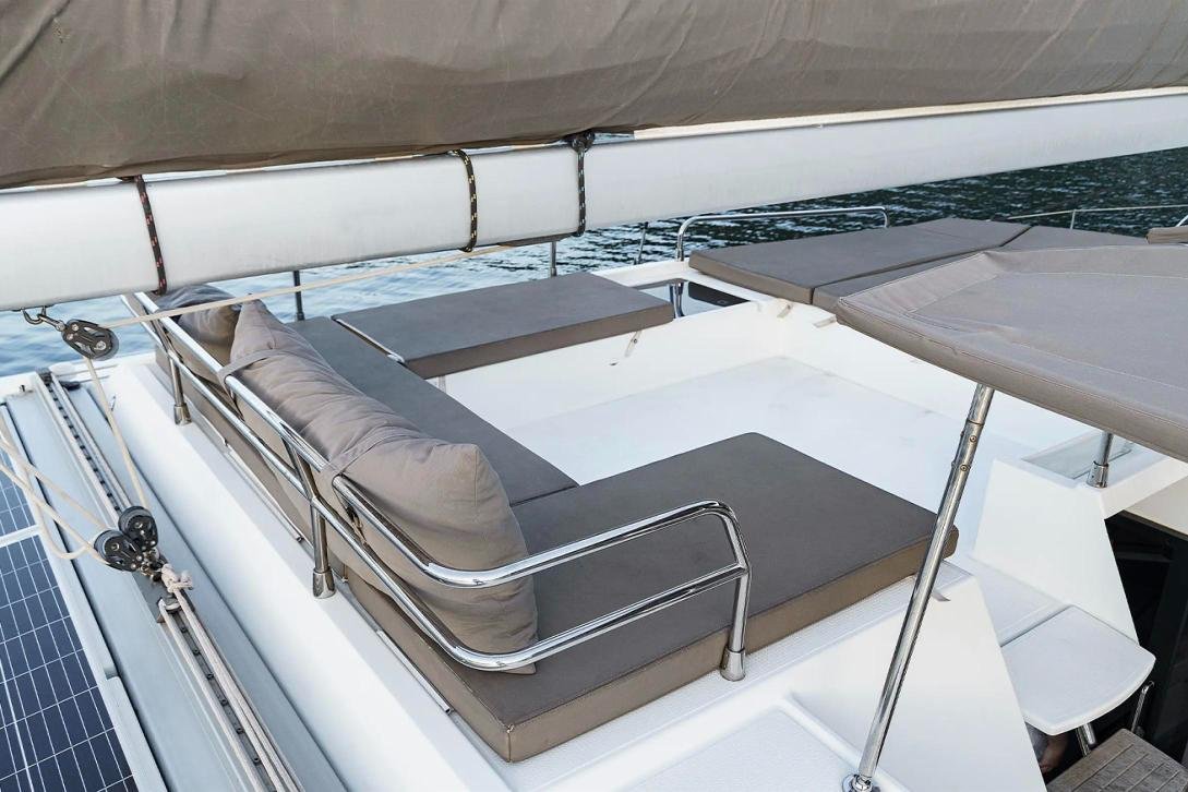Flybridge lounge and sunbeds on a crewed catamaran charter Fethiye